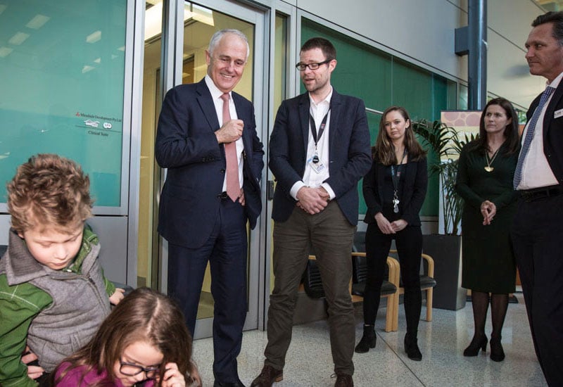 Mr Turnbull speaking with autism researcher Andrew Whitehouse