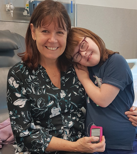 Clinical research nurse Julie Dart with HCL trial participant Faith Pascoe, 15