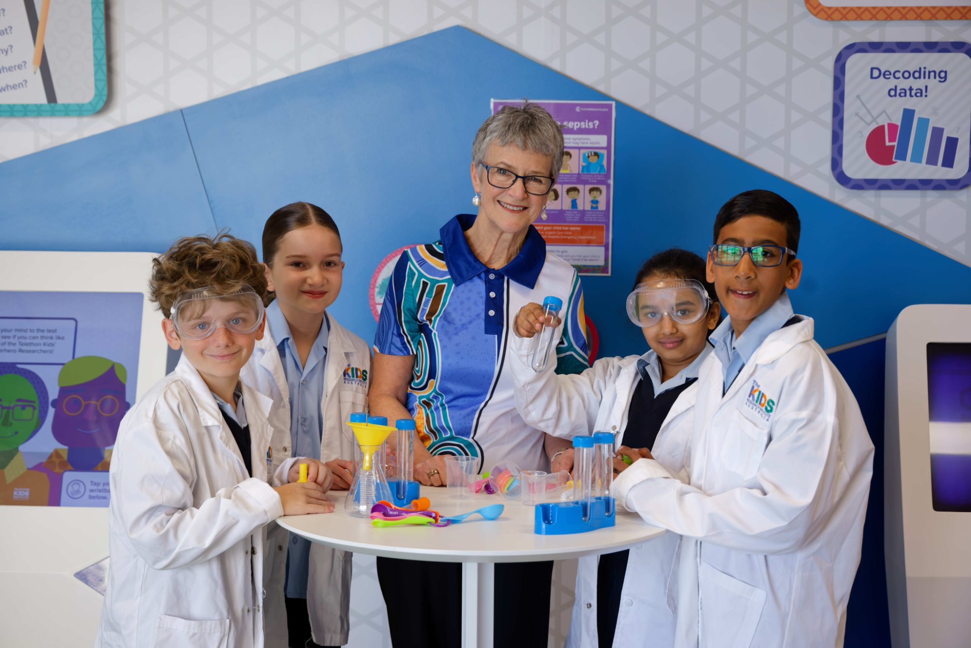 children conducting science experiment