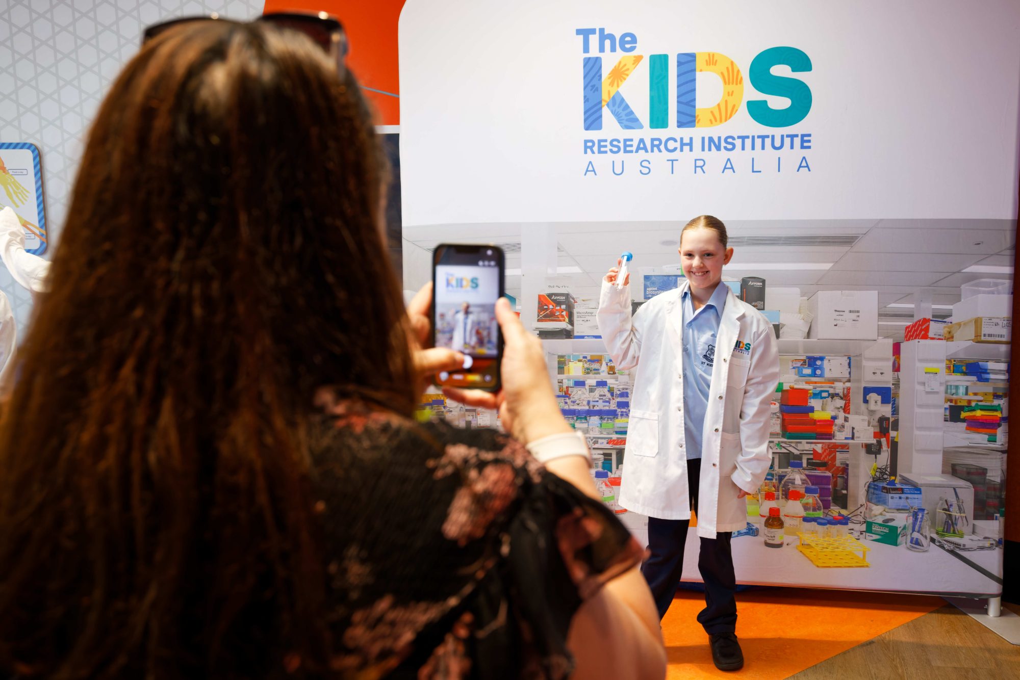 child having their picture taken