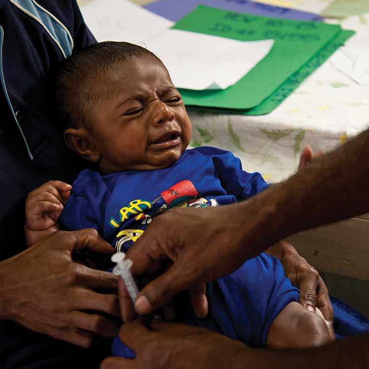 child receiving vaccine